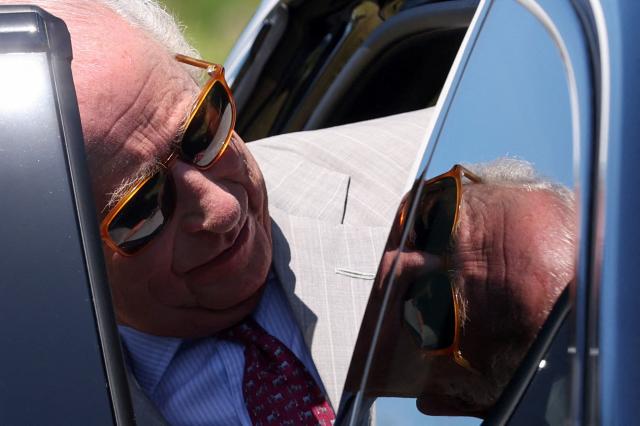Britain's King Charles gets into a car on the day he visits a UK Space Agency (UKSA) site on Cooper's Island, Bermuda, May 2, 2026. King Charles III is in Bermuda for his first visit to a British Overseas Territory as Sovereign. (Photo by Suzanne Plunkett / POOL / AFP)