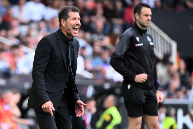 Atletico Madrid's Argentine coach Diego Simeone reacts during the Spanish league football match between Valencia CF and Club Atletico de Madrid at Mestalla Stadium in Valencia on May 2, 2026. (Photo by JOSE JORDAN / AFP)