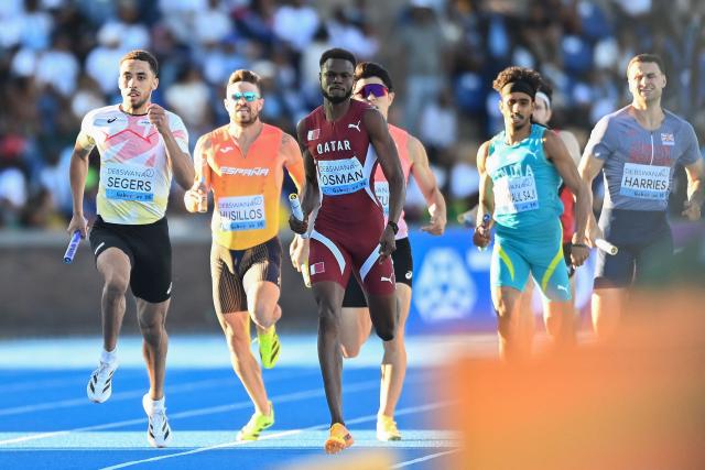 Athletes compete during the men’s 4x400m relay qualifying round 1 during the Gaborone 26 World Athletics Relays at the National Stadium in Gaborone on May 2, 2026. (Photo by AFP)