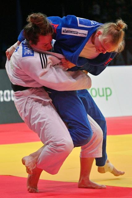 France's Clemence Eme (L) and Slovakia's Nika Koren fight during their women's -70kg judo contest bronze medal match at the Dushanbe Grand Slam judo tournament in Dushanbe on May 2, 2026. (Photo by AFP)