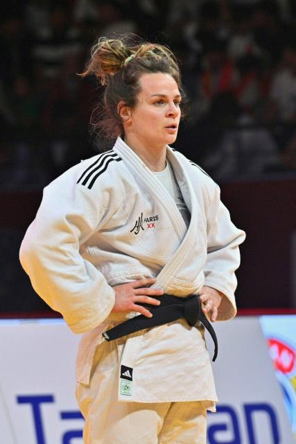 France's Clemence Eme reacts as she fights against Slovakia's Nika Koren during their women's -70kg judo contest bronze medal match at the Dushanbe Grand Slam judo tournament in Dushanbe on May 2, 2026. (Photo by AFP)