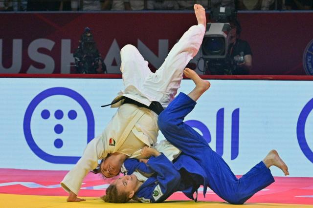 Italy's Irene Pedrotti (L) and Croatia's Jana Cvjetko fight during their women's -70kg judo contest bronze medal match at the Dushanbe Grand Slam judo tournament in Dushanbe on May 2, 2026. (Photo by AFP)