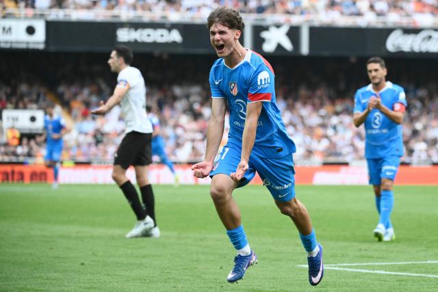 Atletico Madrid's Spanish midfielder #61 Miguel Cubo celebrates scoring his team's second goal during the Spanish league football match between Valencia CF and Club Atletico de Madrid at Mestalla Stadium in Valencia on May 2, 2026. (Photo by JOSE JORDAN / AFP)