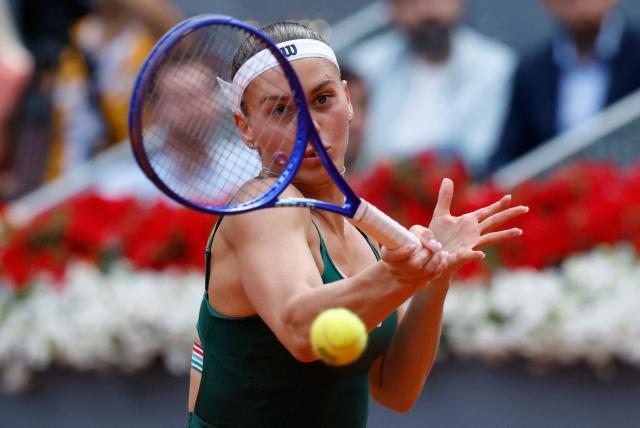 Ukraine's Marta Kostyuk returns a ball to Russia's Mirra Andreeva during the 2026 WTA Tour Madrid Open tennis tournament final singles match at the Caja Magica in Madrid, on May 2, 2026. (Photo by Oscar DEL POZO / AFP)