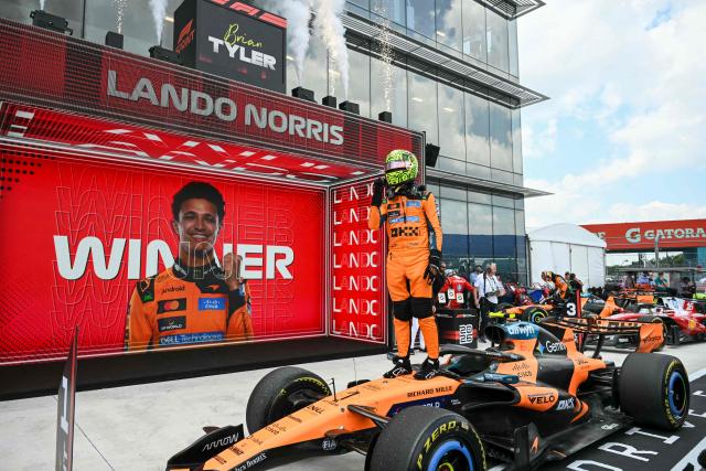 McLaren's British driver Lando Norris celebrates after winning the 2026 Miami Formula One Sprint at Miami International Autodrome in Miami Gardens, Florida, on May 2, 2026. (Photo by CHANDAN KHANNA / AFP)