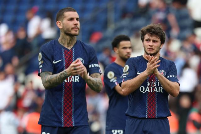 Paris Saint-Germain's French defender #21 Lucas Hernandez (L) and Portuguese midfielder #87 Joao Neves (R) react at the end of the French L1 football match between Paris Saint-Germain (PSG) and FC Lorient at Parc des Princes stadium in Paris on May 2, 2026. (Photo by FRANCK FIFE / AFP)