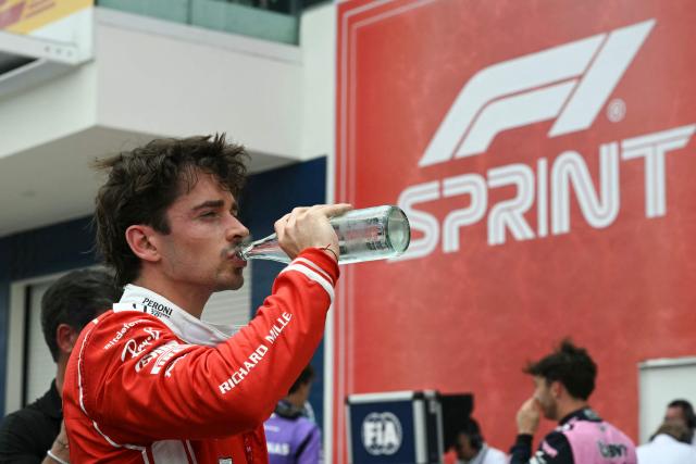 Ferrari's Monegasque driver Charles Leclerc drinks water after finishing in third place during the 2026 Miami Formula One Sprint at Miami International Autodrome in Miami Gardens, Florida, on May 2, 2026. (Photo by CHANDAN KHANNA / AFP)
