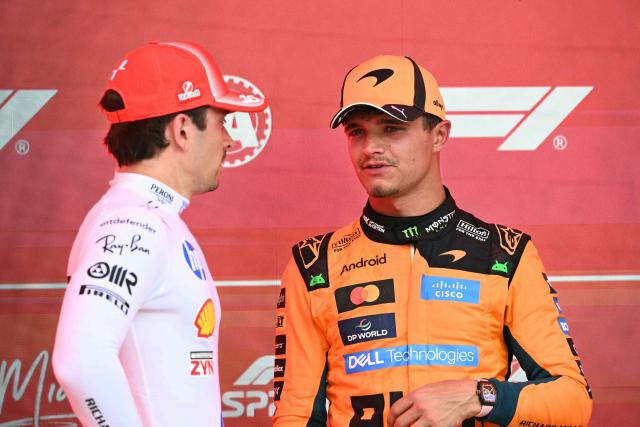 (L/R) Third place finisher Ferrari's Monegasque driver Charles Leclerc speaks with first place finisher McLaren's British driver Lando Norris after the 2026 Miami Formula One Sprint at Miami International Autodrome in Miami Gardens, Florida, on May 2, 2026. (Photo by CHANDAN KHANNA / AFP)