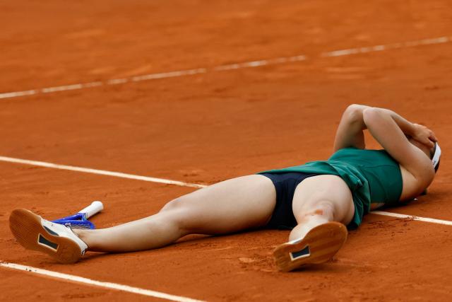 Ukraine's Marta Kostyuk celebrates beating Russia's Mirra Andreeva during the 2026 WTA Tour Madrid Open tennis tournament final singles match at the Caja Magica in Madrid, on May 2, 2026. (Photo by Oscar DEL POZO / AFP)