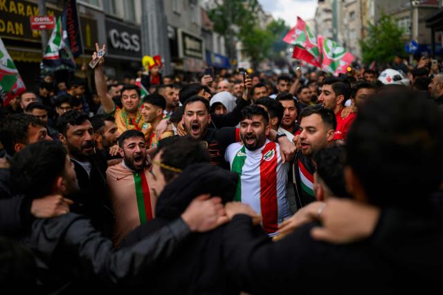 Amedspor fans celebrate their team's promotion to the Turkcell Super League, in Istanbul, on May 2, 2026. Amedspor, a club from Diyarbakir, the "capital" of Turkey's predominantly Kurdish southeast, was promoted to the Turkcell Super League after their 3-3  against Igdirspor. (Photo by Yasin AKGUL / AFP)