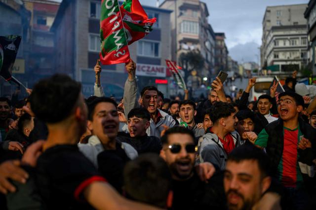 Amedspor fans celebrate their team's promotion to the Turkcell Super League, in Istanbul, on May 2, 2026. Amedspor, a club from Diyarbakir, the "capital" of Turkey's predominantly Kurdish southeast, was promoted to the Turkcell Super League after their 3-3  against Igdirspor. (Photo by Yasin AKGUL / AFP)