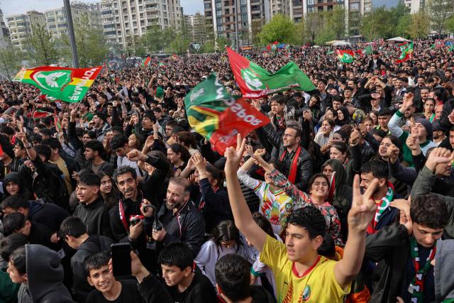 Amedspor fans celebrate their team's promotion to the Turkish Super Lig in Diyarbakir, on May 2, 2026. Amedspor, a club from Diyarbakir, the "capital" of Turkey's predominantly Kurdish southeast, was promoted to the Turkcell Super League after their 3-3  against Igdirspor. (Photo by Bilal Seckin / AFP)