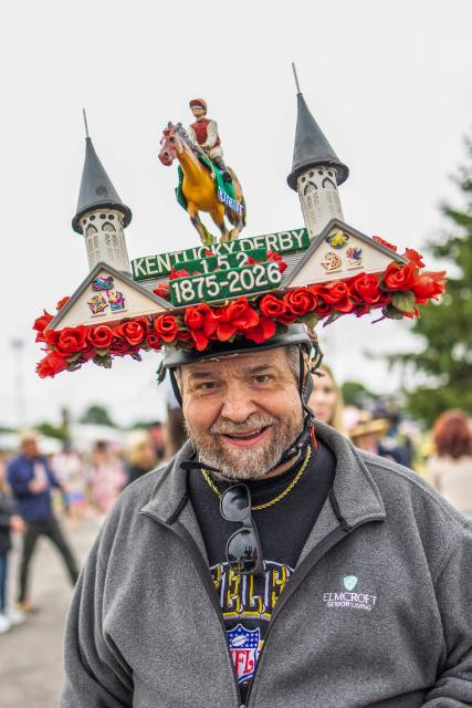 An attendee sports a decorated hat as he arrives to the 152nd running of the Kentucky Derby at Churchill Downs in Louisville, Kentucky, on May 2, 2026. (Photo by Leandro Lozada / AFP)