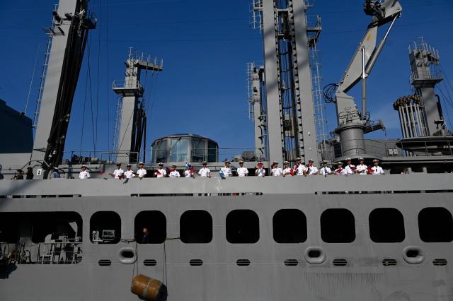 Members of the Taiwanese navy are seen onboard one of three Taiwanese Navy warships after their arrival at Puerto Quetzal, Guatemala on May 2, 2026, as part of a naval squadron. The three vessels -- described as being on a training mission -- powered into Puerto Quetzal, a port town on Guatemala's Pacific coast, in a visit "to strengthen the ties of friendship," Guatemalan officials and Taiwanese diplomats said. (Photo by Johan ORDONEZ / AFP)