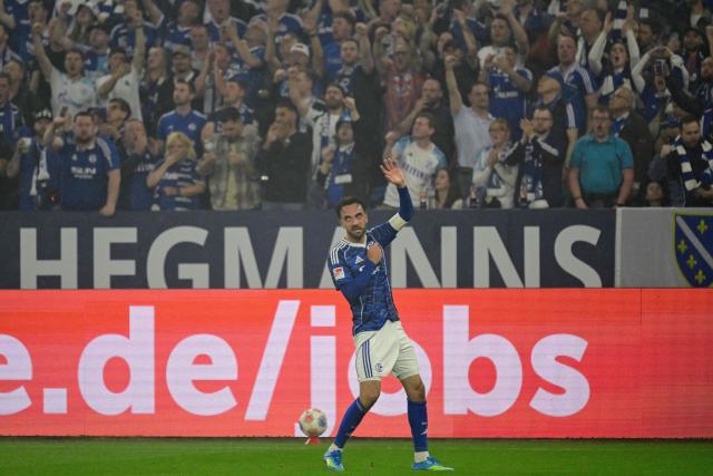 Schalke's Turkish midfielder #19 Kenan Karaman celebrates scoring the opening goal during the German second division Bundesliga football match between FC Schalke 04 and Fortuna Duesseldorf at the Veltins Arena in Gelsenkirchen, western Germany on May 2, 2026. Schalke are pushing to return to the first division next season with a win against Fortuna Duesseldorf on May 2, 2026. (Photo by INA FASSBENDER / AFP) / DFL REGULATIONS PROHIBIT ANY USE OF PHOTOGRAPHS AS IMAGE SEQUENCES AND/OR QUASI-VIDEO