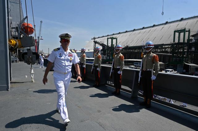 Members of the Taiwanese navy are seen onboard one of three Taiwanese Navy warships after their arrival at Puerto Quetzal, Guatemala on May 2, 2026, as part of a naval squadron. The three vessels -- described as being on a training mission -- powered into Puerto Quetzal, a port town on Guatemala's Pacific coast, in a visit "to strengthen the ties of friendship," Guatemalan officials and Taiwanese diplomats said. (Photo by Johan ORDONEZ / AFP)