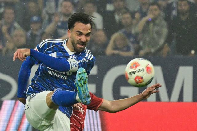 Schalke's Turkish midfielder #19 Kenan Karaman scores the opening goal during the German second division Bundesliga football match between FC Schalke 04 and Fortuna Duesseldorf at the Veltins Arena in Gelsenkirchen, western Germany on May 2, 2026. Schalke are pushing to return to the first division next season with a win against Fortuna Duesseldorf on May 2, 2026. (Photo by INA FASSBENDER / AFP) / DFL REGULATIONS PROHIBIT ANY USE OF PHOTOGRAPHS AS IMAGE SEQUENCES AND/OR QUASI-VIDEO