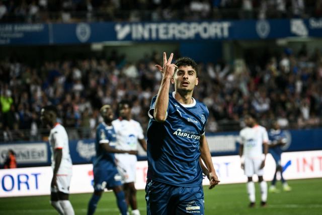 Troyes' French midfielder #5 Martin Adeline celebrates after scoring a goal during the French L2 football match between Troyes and Laval at the stade de l'Aube in Troyes, eastern France, on May 2, 2026. (Photo by ARNAUD FINISTRE / AFP)
