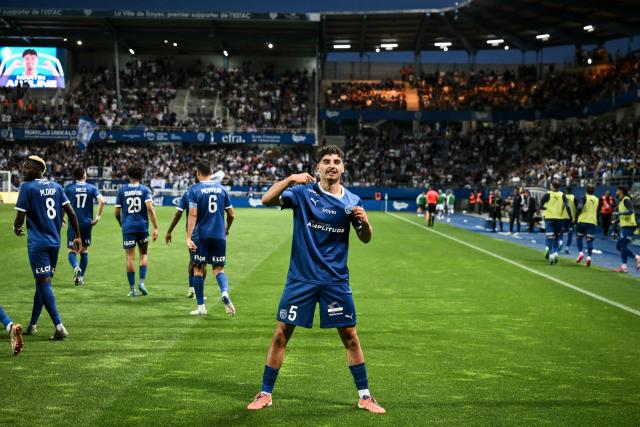 Troyes' French midfielder #5 Martin Adeline celebrates after his team's goal during the French L2 football match between Troyes and Laval at the stade de l'Aube in Troyes, eastern France, on May 2, 2026. (Photo by ARNAUD FINISTRE / AFP)