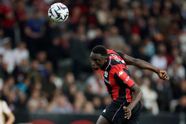 Nice's Senegalese defender #33 Antoine Mendy heads the ball during the French L1 football match between OGC Nice and RC Lens at the Allianz Riviera Stadium in Nice on May 2, 2026. (Photo by Valery HACHE / AFP)