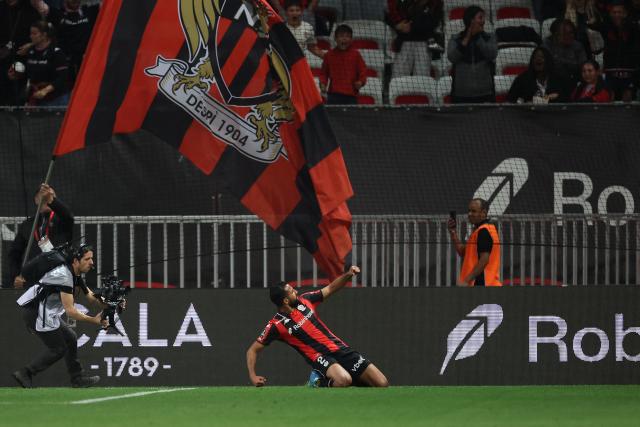 Nice's Tunisian defender #02 Ali Abdi celebrates after scoring a goal during the French L1 football match between OGC Nice and RC Lens at the Allianz Riviera Stadium in Nice on May 2, 2026. (Photo by Valery HACHE / AFP)