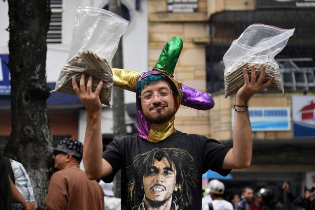 An activist sposes for a picture during the World Marijuana March in Medellin, Colombia, on May 2, 2026. (Photo by Jaime SALDARRIAGA / AFP)