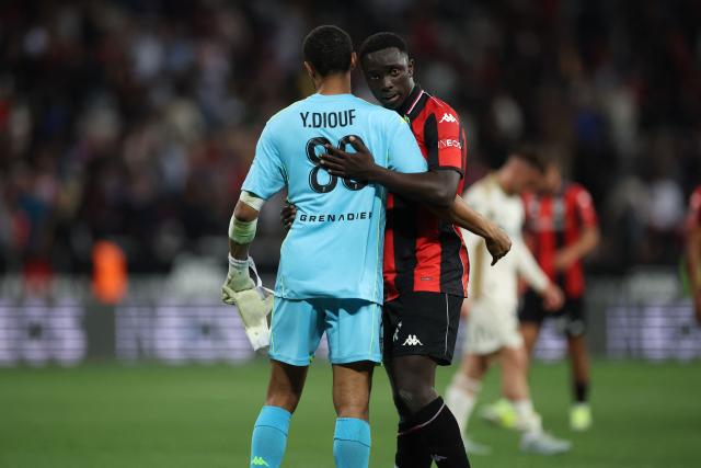 Nice's Senegalese defender #33 Antoine Mendy (L) reacts at the end of the French L1 football match between OGC Nice and RC Lens at the Allianz Riviera Stadium in Nice on May 2, 2026. (Photo by Valery HACHE / AFP)