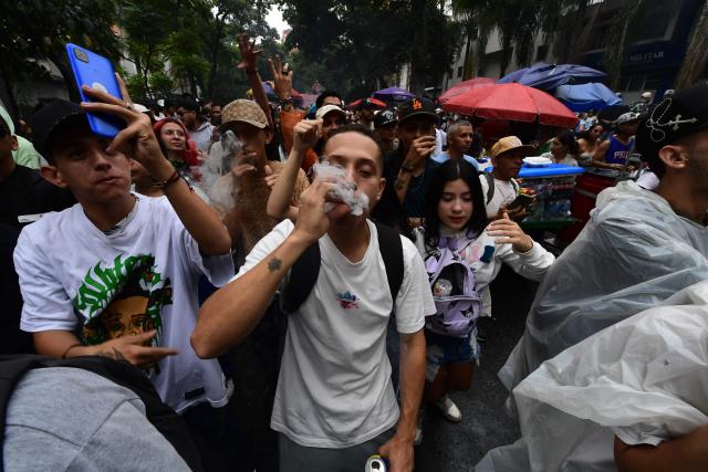 People take part in the World Marijuana March in Medellin, Colombia, on May 2, 2026. (Photo by Jaime SALDARRIAGA / AFP)