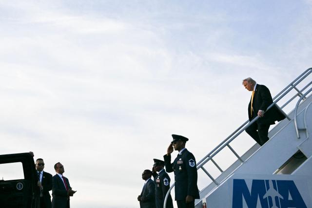 US President Donald Trump steps off Air Force One at Miami International Airport in Miami, on May 2, 2026. (Photo by Jim WATSON / AFP)
