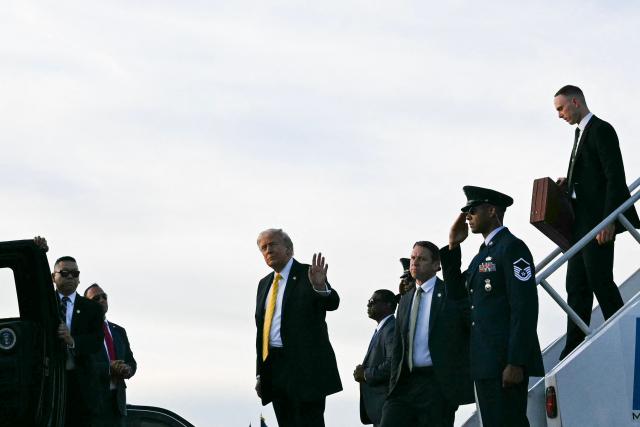 US President Donald Trump steps off Air Force One at Miami International Airport in Miami, on May 2, 2026. (Photo by Jim WATSON / AFP)
