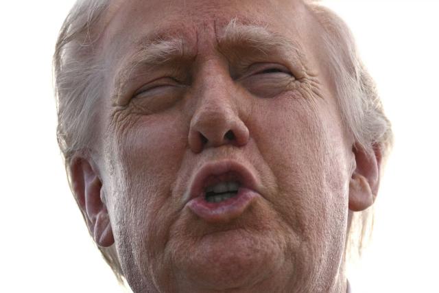 US President Donald Trump speaks with reporters at Palm Beach International Airport in West Palm Beach, Florida on May 2, 2026, before boarding Air Force One en route to Miami. (Photo by Jim WATSON / AFP)