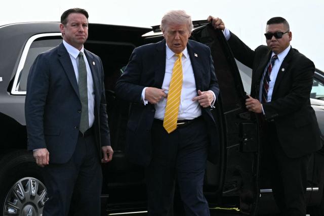 US President Donald Trump arrives at Palm Beach International Airport in West Palm Beach, Florida on May 2, 2026, before boarding Air Force One en route to Miami. (Photo by Jim WATSON / AFP)