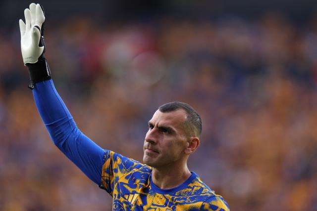Tigres' Argentine goalkeeper #01 Nahuel Guzman waves during the Mexican League quarterfinal first leg football match between Tigres and Guadalajara at the Universitario stadium in Monterrey, Nuevo Leon state, Mexico on May 2, 2026. (Photo by Julio Cesar AGUILAR / AFP)
