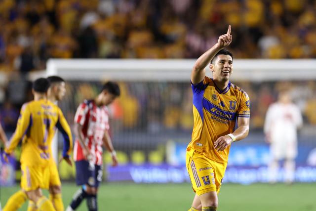 Tigres' defender #27 Jesus Angulo celebrates scoring his team's first goal during the Mexican League Clausura Tournament quarterfinal first leg football match between Tigres and Guadalajara at the Universitario stadium in Monterrey, Nuevo Leon state, Mexico on May 2, 2026. (Photo by Julio Cesar AGUILAR / AFP)