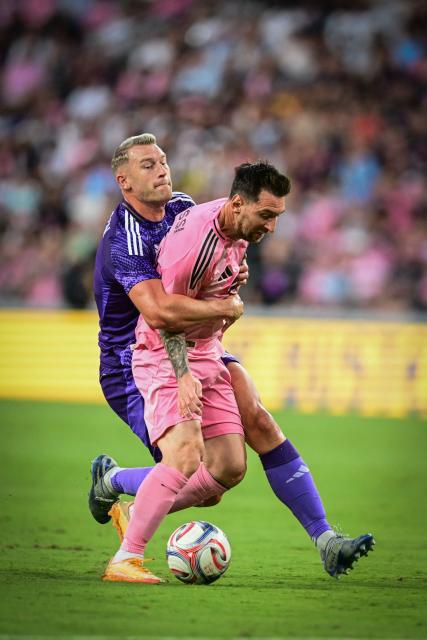 Inter Miami's Argentine forward, #10 Lionel Messi, vies for the ball against Orlando City's Swedish defender #6 Robin Jansson during a Major League Soccer (MLS) regular season football match between Inter Miami CF and Orlando City SC at NU Stadium in Miami, on May 2, 2026. (Photo by Giorgio Viera / AFP)