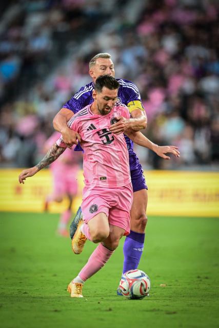 Inter Miami's Argentine forward, #10 Lionel Messi, vies for the ball against Orlando City's Swedish defender #6 Robin Jansson during a Major League Soccer (MLS) regular season football match between Inter Miami CF and Orlando City SC at NU Stadium in Miami, on May 2, 2026. (Photo by Giorgio Viera / AFP)