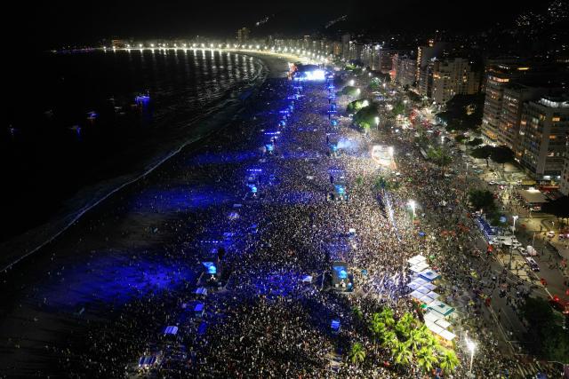 This aerial view shows Colombian singer Shakira performing during a free concert at Copacabana Beach in Rio de Janeiro, Brazil, on May 2, 2026. (Photo by Mauro PIMENTEL / AFP)