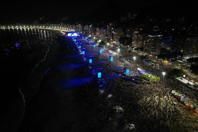 This aerial view shows Colombian singer Shakira performing during a free concert at Copacabana Beach in Rio de Janeiro, Brazil, on May 2, 2026. (Photo by Mauro PIMENTEL / AFP)