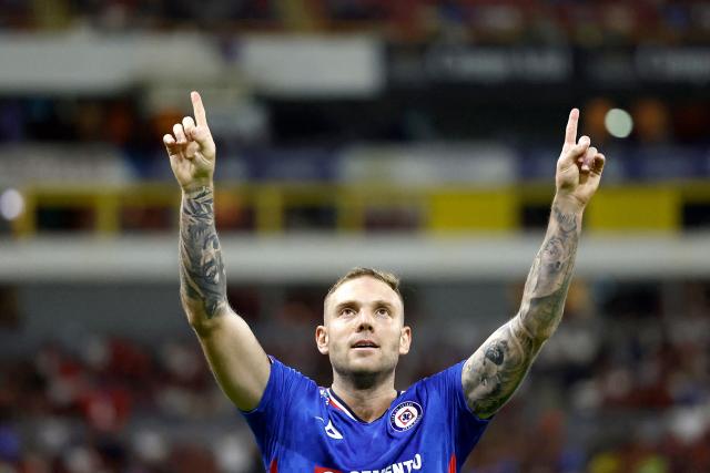 Cruz Azul's Argentine forward #29 Rodolfo Rotondi celebrates scoring his team's first goal during the Mexican League Clausura Tournament quarterfinal first leg football match between Atlas and Cruz Azul at the Jalisco stadium in Guadalajara, Jalisco state, Mexico on May 2, 2026. (Photo by Ulises RUIZ / AFP)
