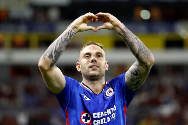Cruz Azul's Argentine forward #29 Rodolfo Rotondi celebrates scoring his team's first goal during the Mexican League Clausura Tournament quarterfinal first leg football match between Atlas and Cruz Azul at the Jalisco stadium in Guadalajara, Jalisco state, Mexico on May 2, 2026. (Photo by Ulises RUIZ / AFP)