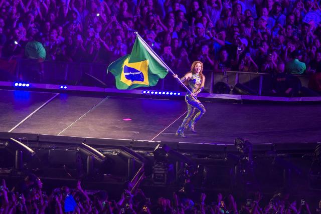 Colombian singer Shakira holds a Brazilian flag during her free concert at Copacabana Beach in Rio de Janeiro, Brazil, on May 2, 2026. (Photo by Daniel RAMALHO / AFP)