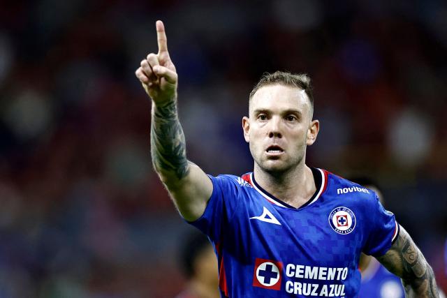 Cruz Azul's Argentine forward #29 Rodolfo Rotondi celebrates scoring his team's first goal during the Mexican League Clausura Tournament quarterfinal first leg football match between Atlas and Cruz Azul at the Jalisco stadium in Guadalajara, Jalisco state, Mexico on May 2, 2026. (Photo by Ulises RUIZ / AFP)