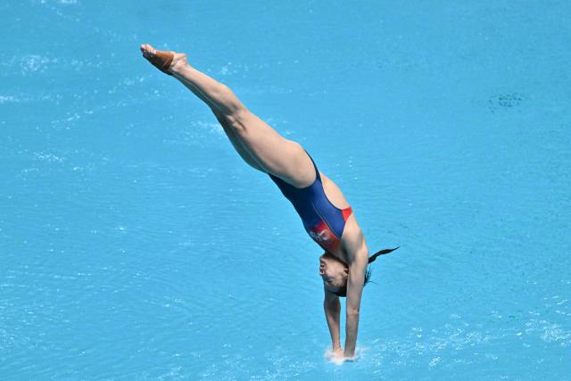 Chinaґs Chen Jia competes in the women’s 3m springboard event during the World Aquatics Diving World Cup Super Final at the Water Cube in Beijing on May 3, 2026. (Photo by Pedro PARDO / AFP)