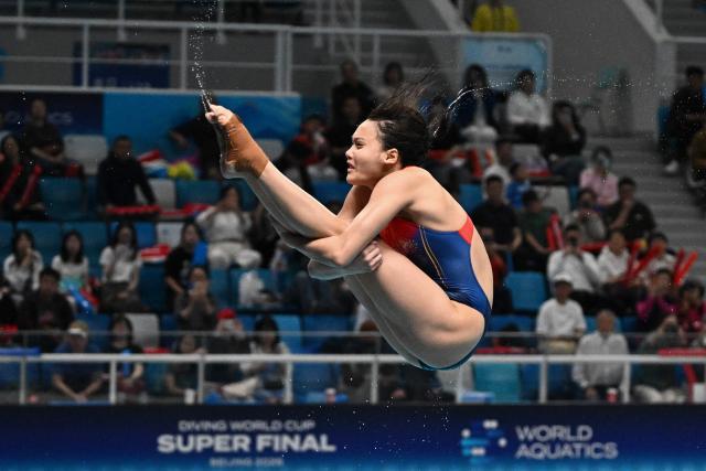 Chinaґs Chen Jia competes in the women’s 3m springboard event during the World Aquatics Diving World Cup Super Final at the Water Cube in Beijing on May 3, 2026. (Photo by Pedro PARDO / AFP)