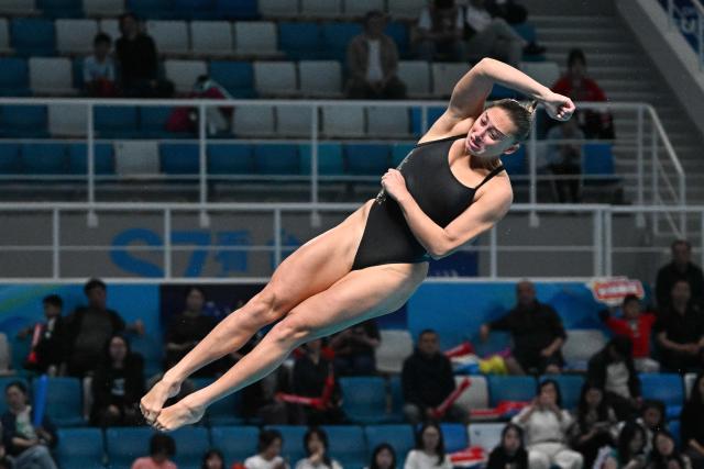 Australiaґs Alysha Koloi competes in the women’s 3m springboard event during the World Aquatics Diving World Cup Super Final at the Water Cube in Beijing on May 3, 2026. (Photo by Pedro PARDO / AFP)