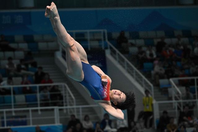 Chinaґs Chen Yiwen competes in the women’s 3m springboard event at the World Aquatics Diving World Cup Super Final at the Water Cube in Beijing on May 3, 2026. (Photo by Pedro PARDO / AFP)
