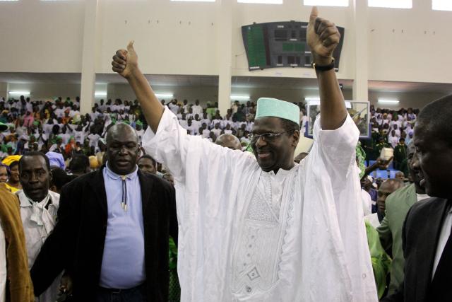 (FILES) Mali's presidential candidate and lawyer Mountaga Tall (C) celebrates after being inaugurated as presidential candidate of his party for April's election, in Bamako on January 15, 2012. A well-known Malian lawyer and politician critical of the ruling junta was abducted overnight by masked men in Bamako, members of his family told AFP on May 3, 2026.
His disappearance comes as Mali's junta faces a major crisis following large-scale attacks on several strategic junta positions last weekend and the killing of its defence minister. (Photo by HABIBOU KOUYATE / AFP)