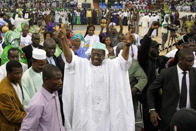 (FILES) Mali's presidential candidate and lawyer Mountaga Tall (C) celebrates after being inaugurated as presidential candidate of his party for April's election, in Bamako on January 15, 2012. A well-known Malian lawyer and politician critical of the ruling junta was abducted overnight by masked men in Bamako, members of his family told AFP on May 3, 2026.
His disappearance comes as Mali's junta faces a major crisis following large-scale attacks on several strategic junta positions last weekend and the killing of its defence minister. (Photo by HABIBOU KOUYATE / AFP)