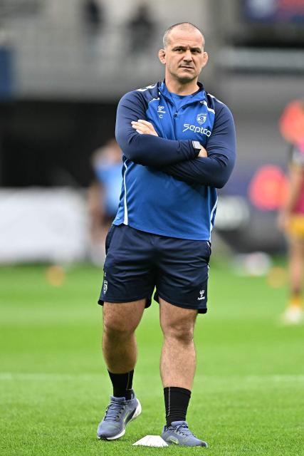 Montpellier's French head coach Joan Caudullo looks on during warm up prior to the  European Challenge Cup rugby union semi-final match between Montpellier Herault Rugby and Dragons RFC at the Septeo Stadium in Montpellier, southern France, on May 3, 2026. (Photo by Gabriel BOUYS / AFP)