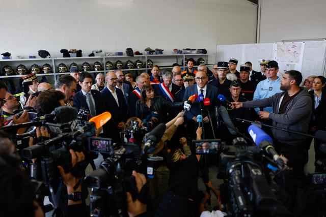 France's Interior Minister Laurent Nunez speaks to the press during a presentation of the fire brigade's deployment on and around a "teknival" rave party at a military site in Cornusse, near Bourges, at a fire station in Baugy, central France on May 3, 2026. Between 17,000 and 40,000 people participate in the free party which has been taking place, without major incident, since May 1, 2026. The gathering comes as the French parliament is seeking to tighten legislation against unauthorised rave parties, introducing prison sentences for organisers and fines for attendees. (Photo by Kenzo TRIBOUILLARD / AFP)